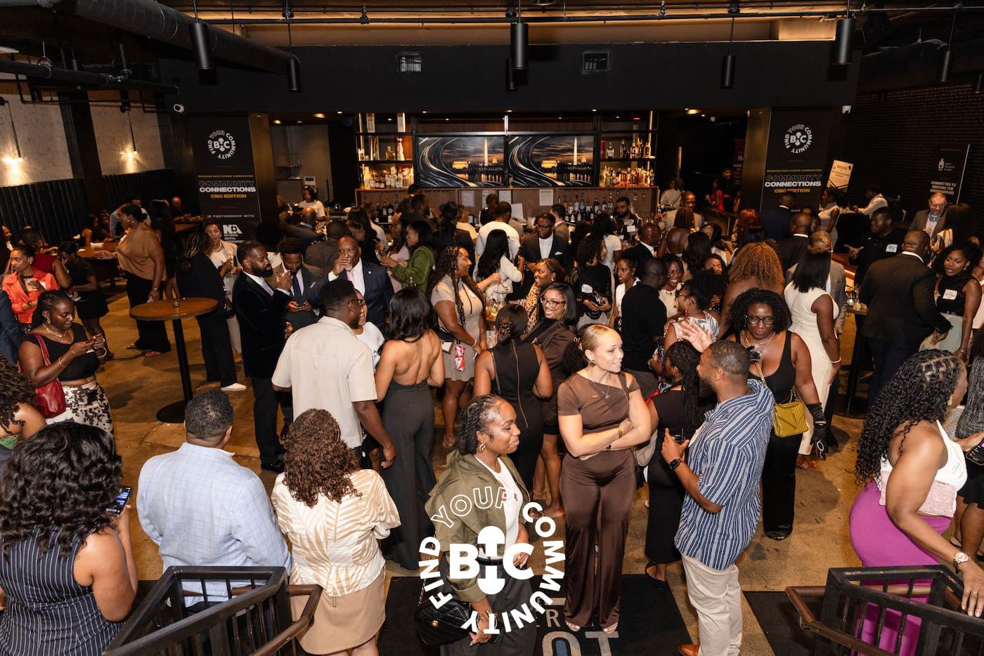 A full room of guests networking at The Gathering Spot